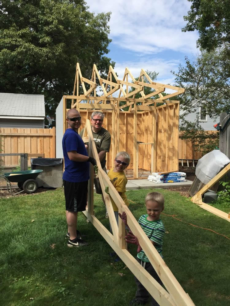 Building the shed roof rafters and trusses.