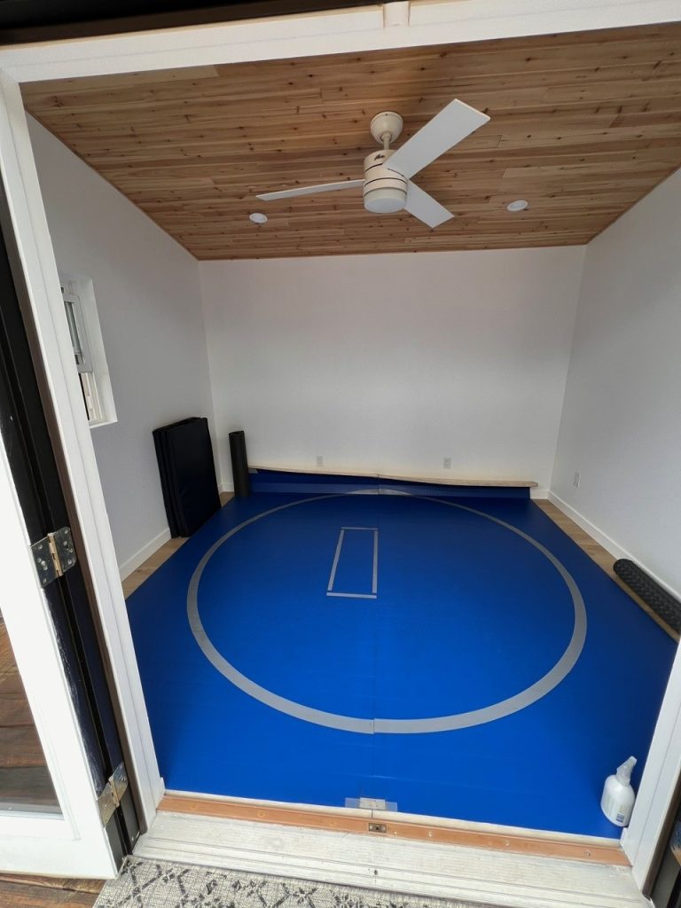 Padded floor for backyard shed used as a Yoga studio. Workout Room