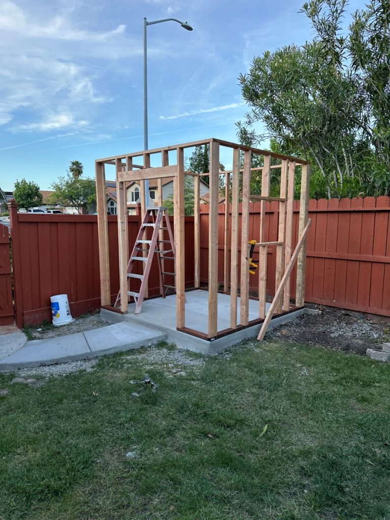 8x10 backyard shed concrete floor and foundation, walls framed