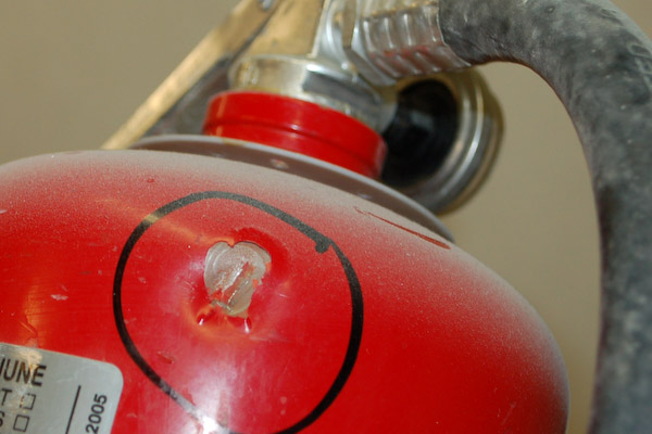 fire extinguisher dent