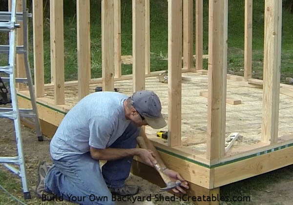 install nails to temporarily hold siding