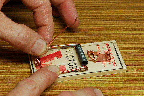 lock bar over snap wire mouse trap