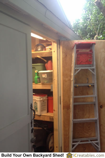 Interior wall storage shelves for shed