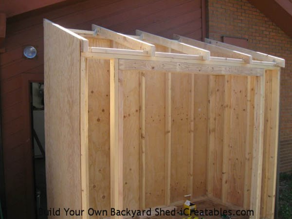 siding installed on shed