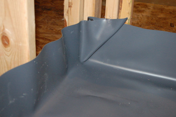 shower pan liner corner fold inside