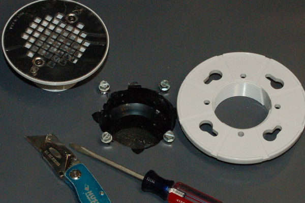 shower pan liner cut weep holes