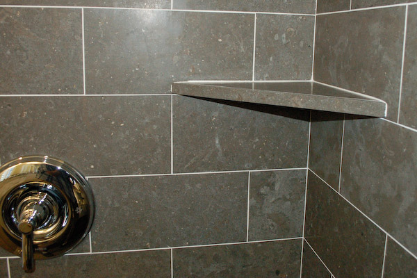 Install a Corner Shower Shelf With Tiles