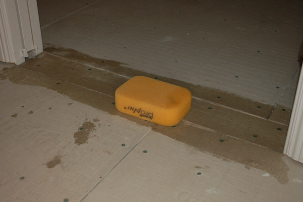 wet the cement backer board
